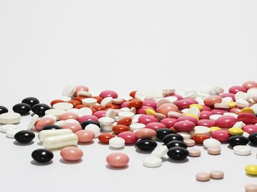 oval drugs on floor